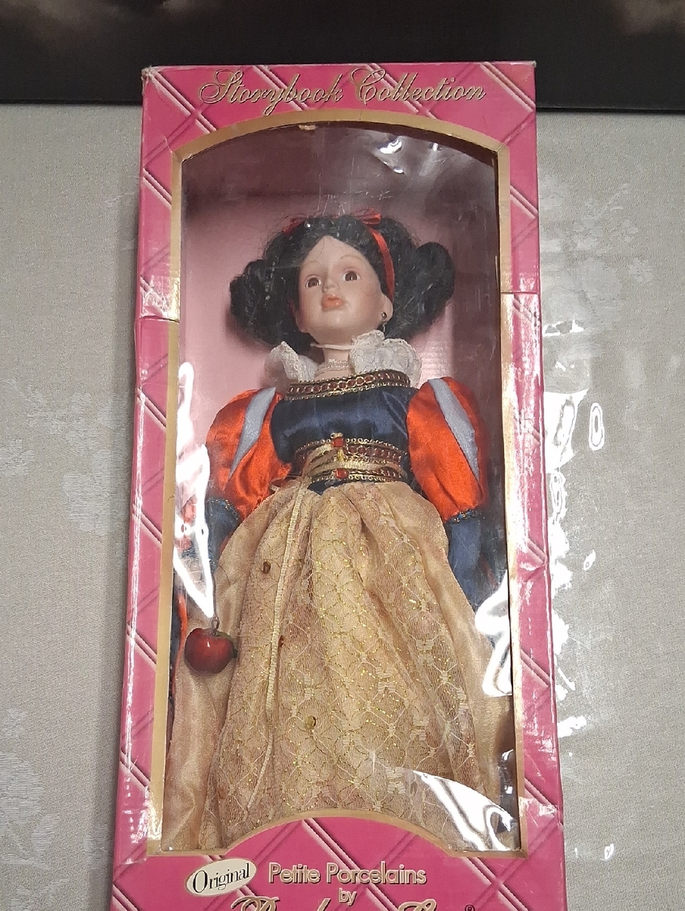 This image shows a Snow White doll from the Barbara Lee Petite Porcelain Story